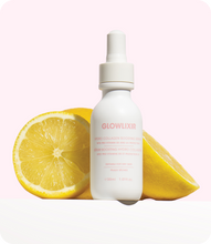 Load image into Gallery viewer, Glowlixir Hydro Collagen Boosting Serum bottle with ingredients in the back ground